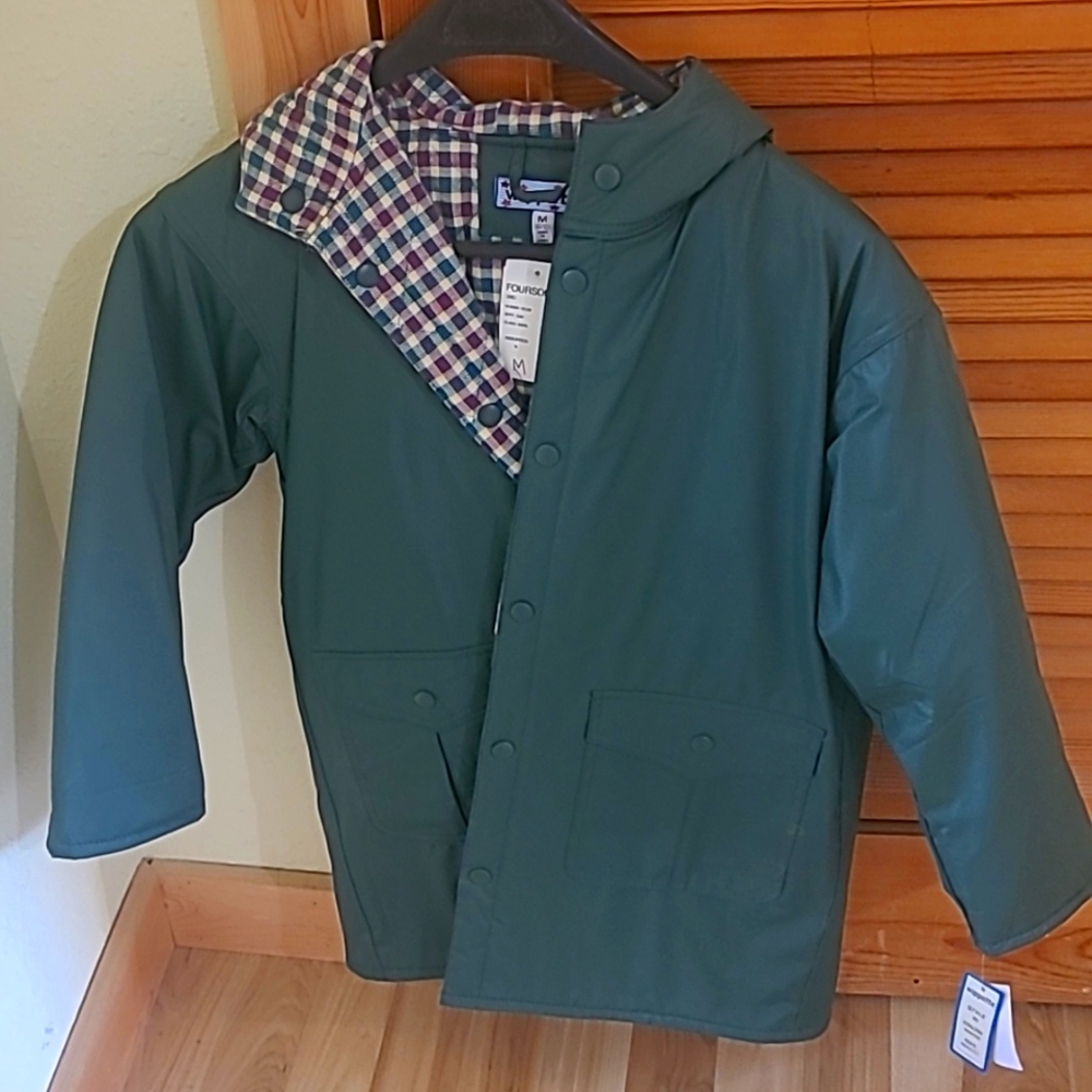Youth Wippette brand hooded, insulated rain coat. Size Medium. New with tags.